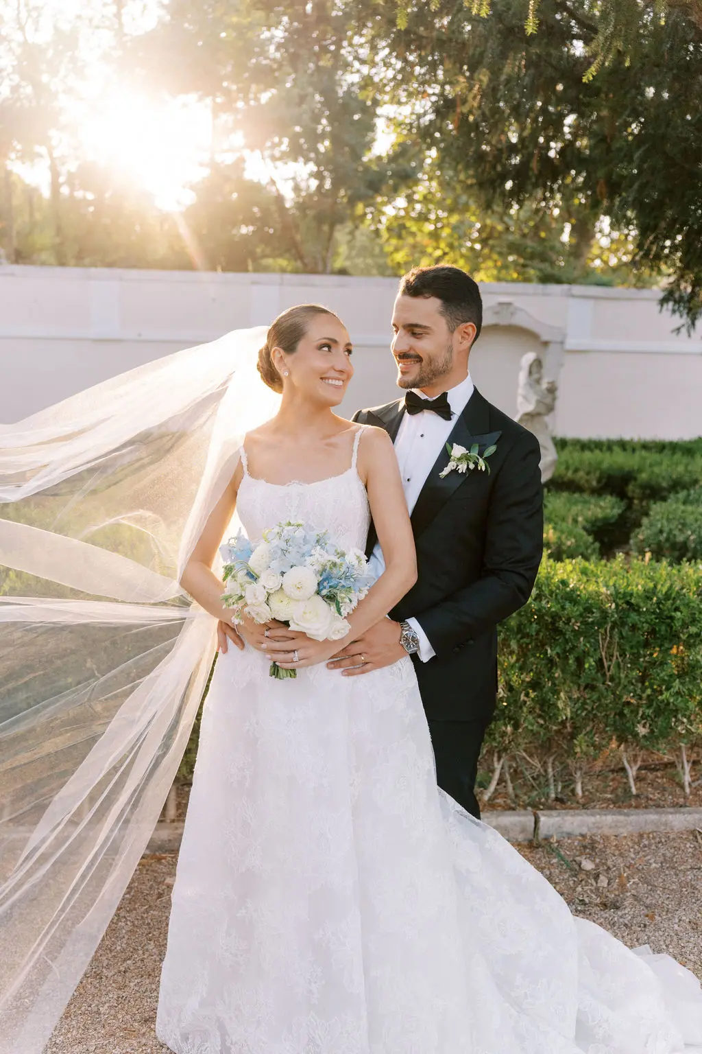 Dana and Miguel together in warm late-afternoon light