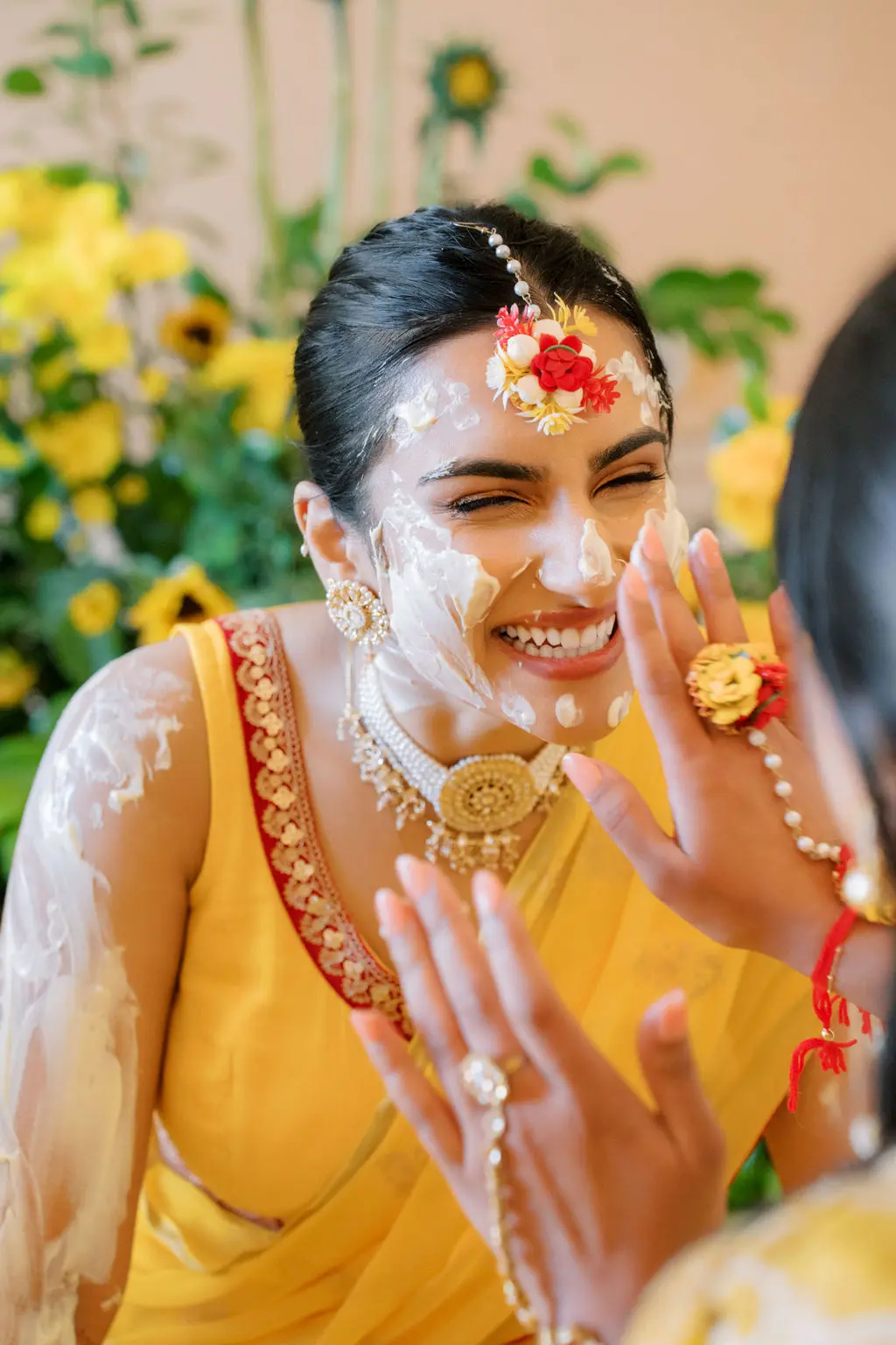 A joyful Haldi celebration at Isha and Rahul's wedding