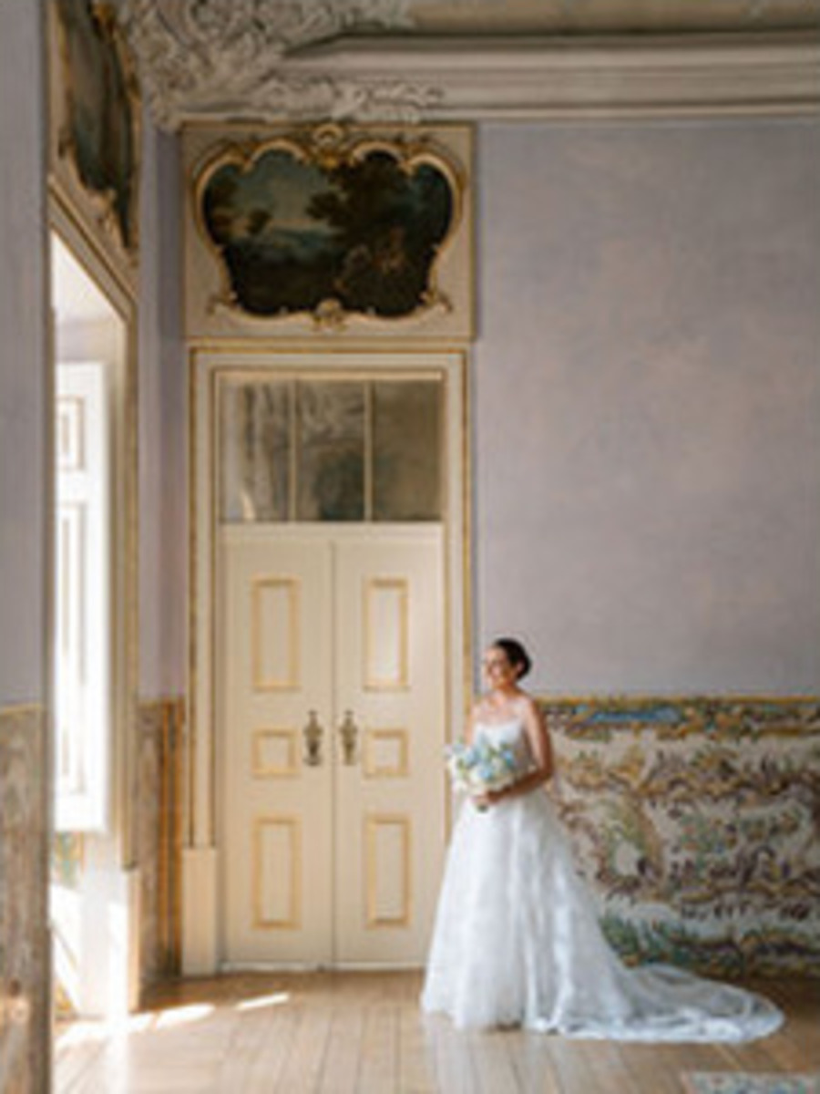 A wedding portrait framed by Portuguese azulejo tiles