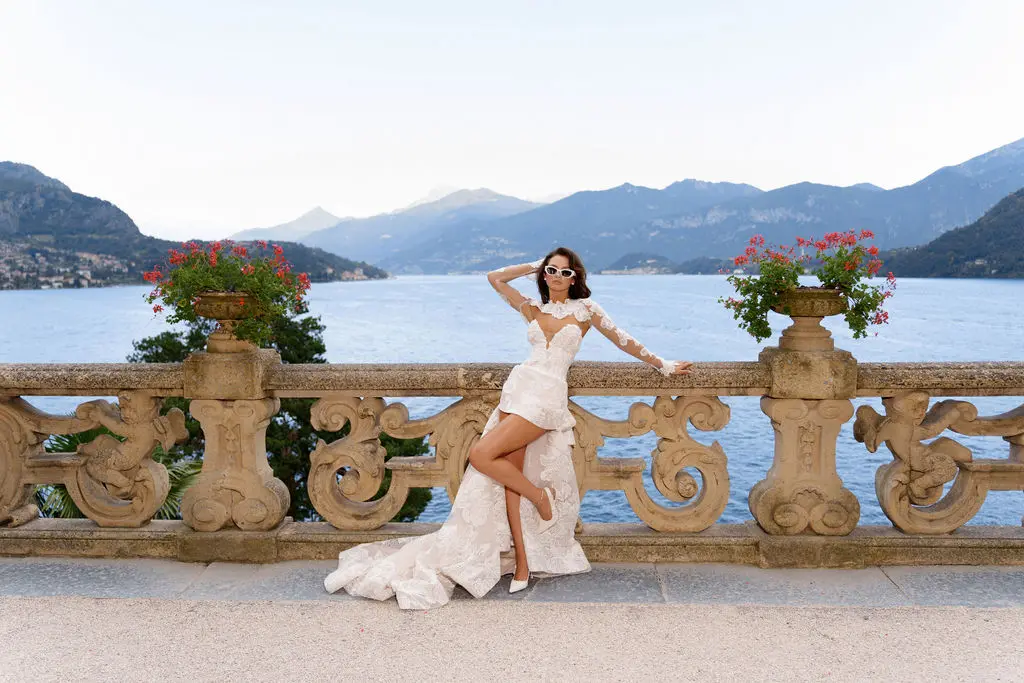 Rose overlooking Lake Como from an ornate stone terrace
