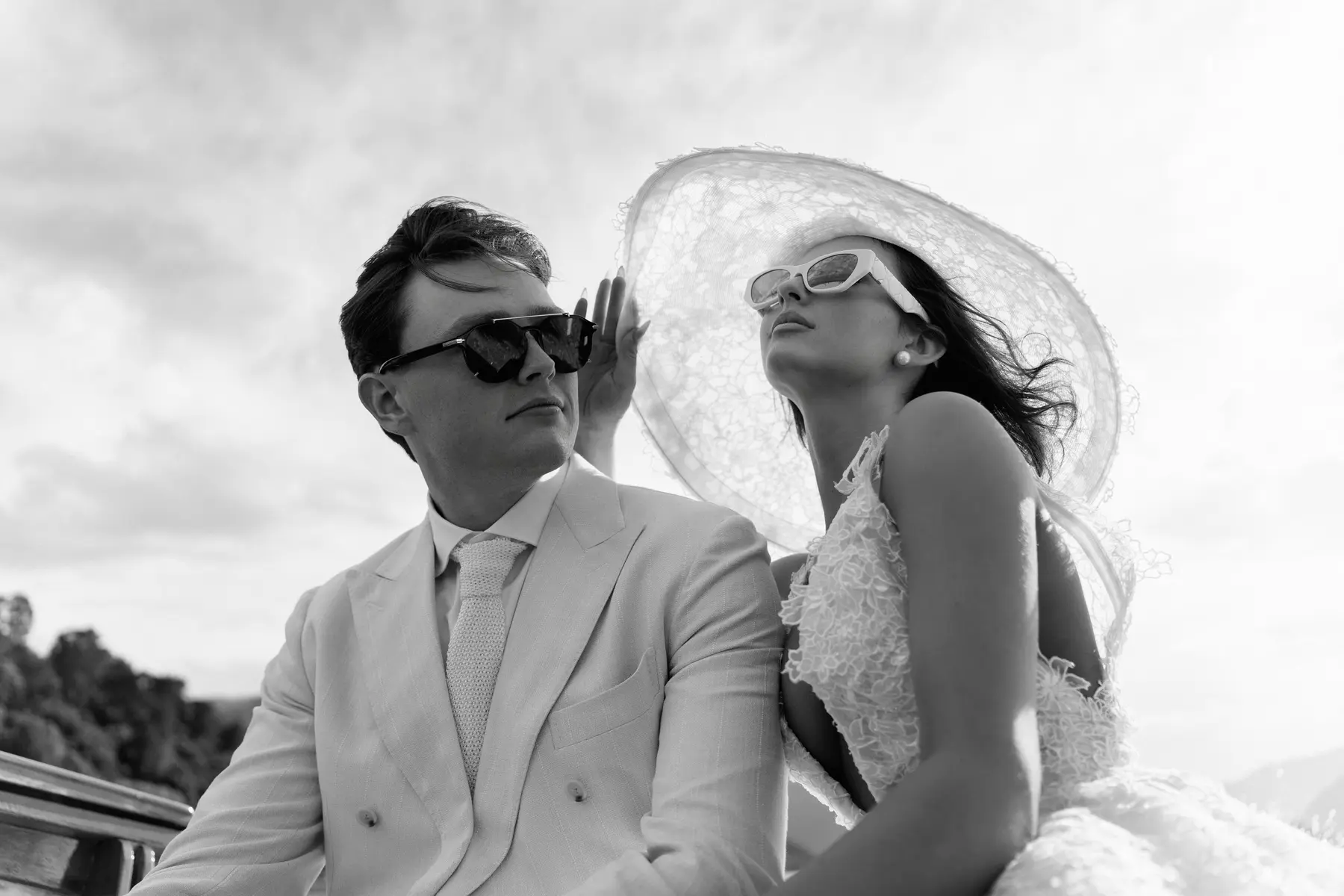 Rose and Hunter together in black and white beside Lake Como